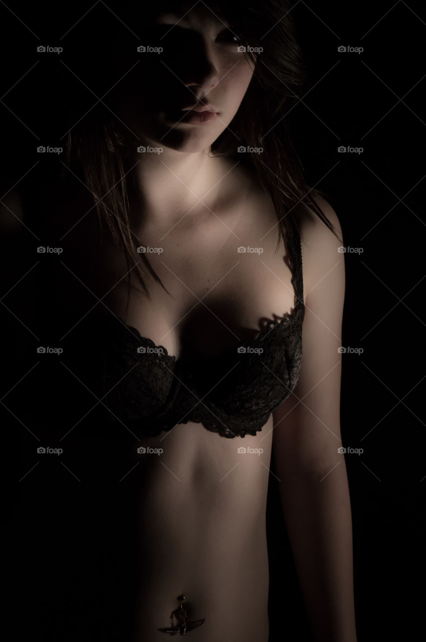 Young woman with black background