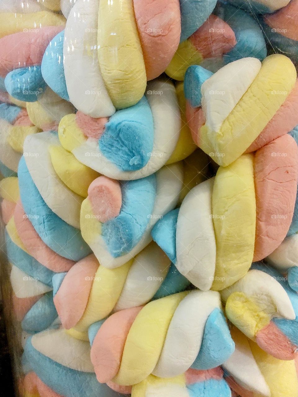 marshmallows, in colors of pastels, yellow, pink, and baby blue, are beautiful and kids love them. Many adults like them too, a good way to reminisce about the old days.