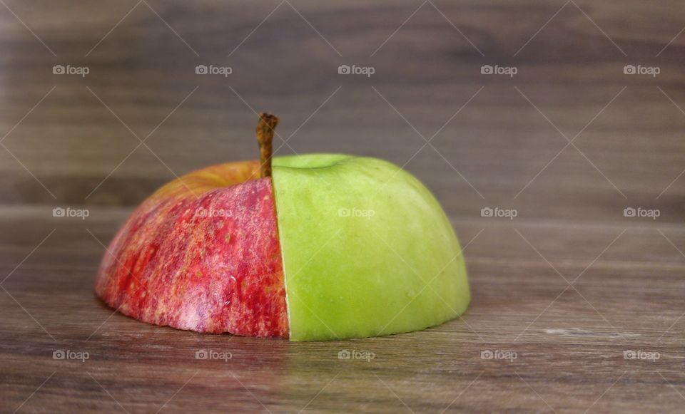 Slice of red and green apple