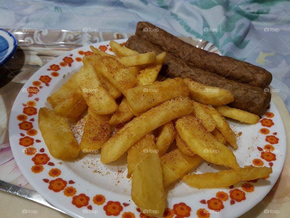 Another Dutch dish! Frikandel and fries.