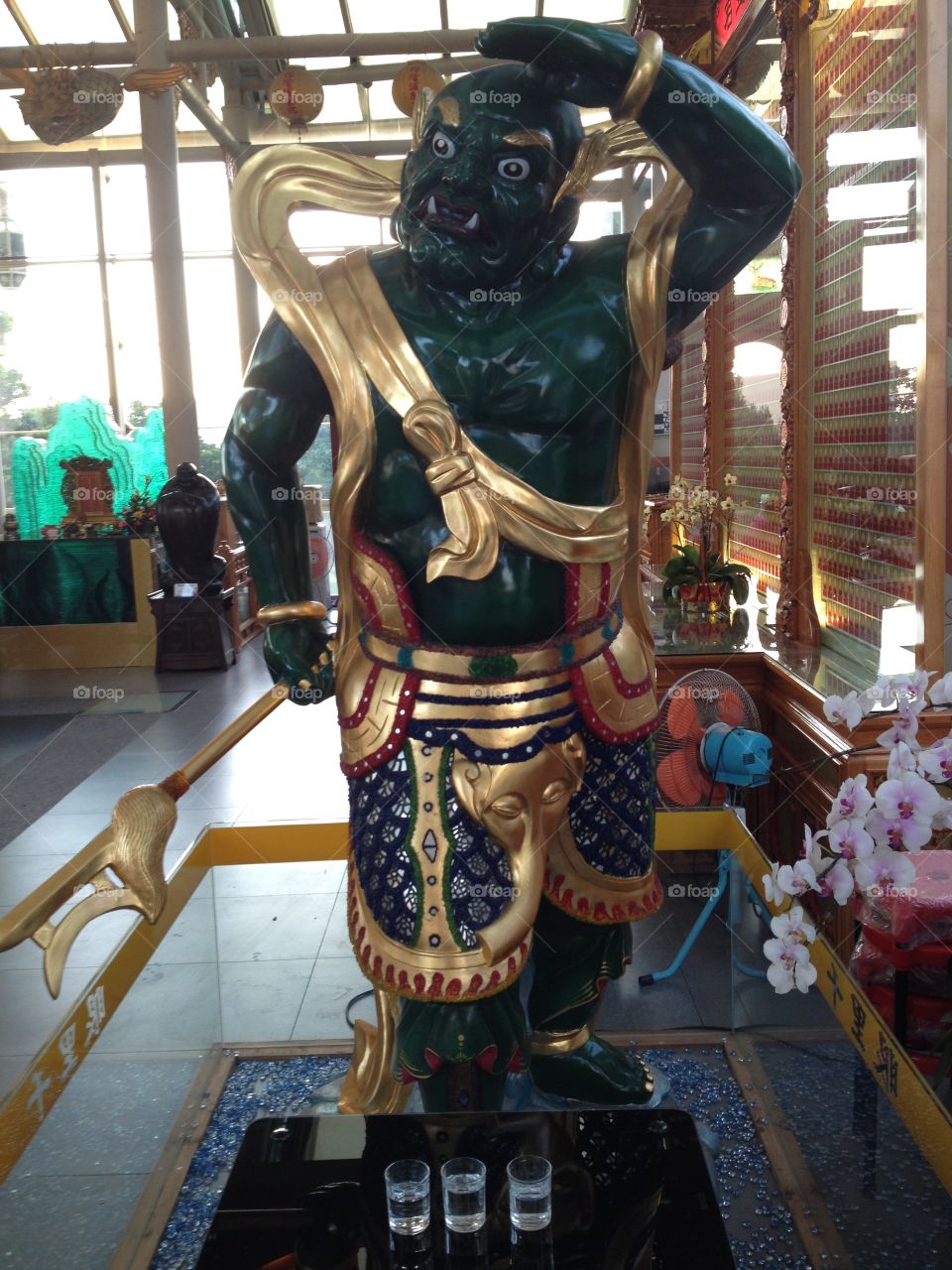 A colorful statue in a Buddhist temple. 