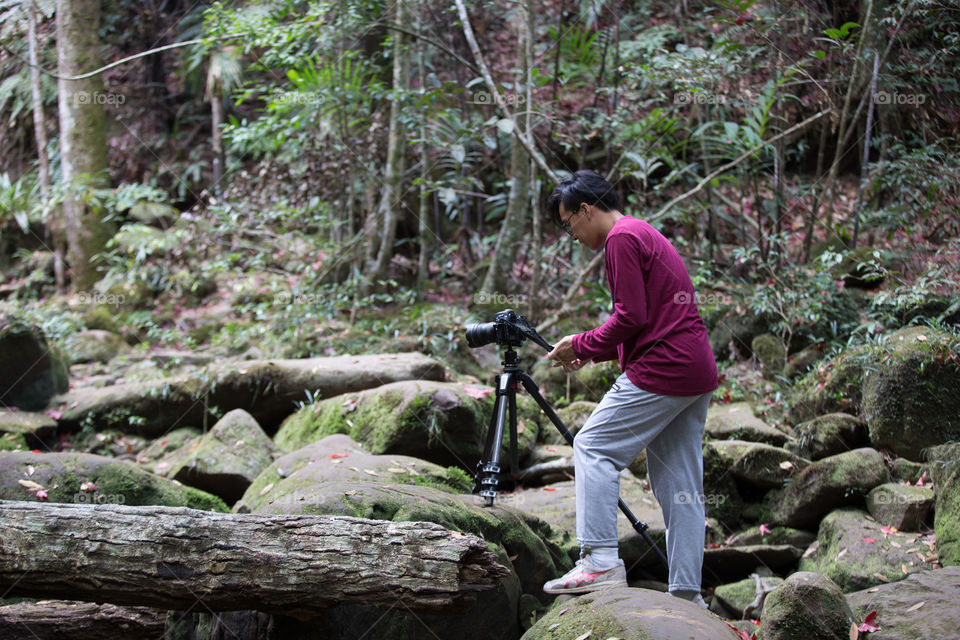 Photographer in the forest 