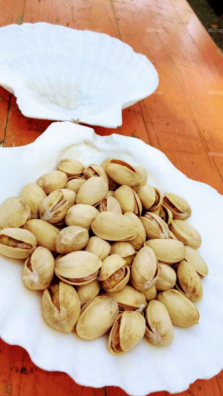 Pistachios while tasting wine  