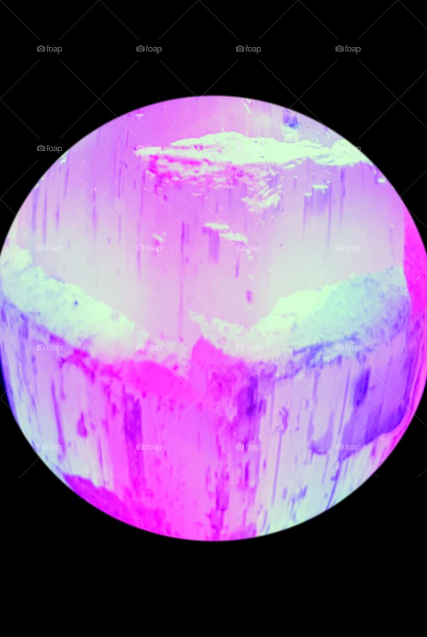 Selenite crystal with beautiful vibrant color. Creation of a new planet in this magical world of photos.