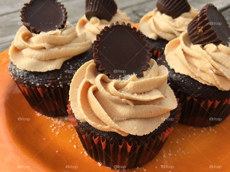 Chocolate Cupcakes with Peanut Butter Buttercream Icing topped with a Peanut Butter Cup