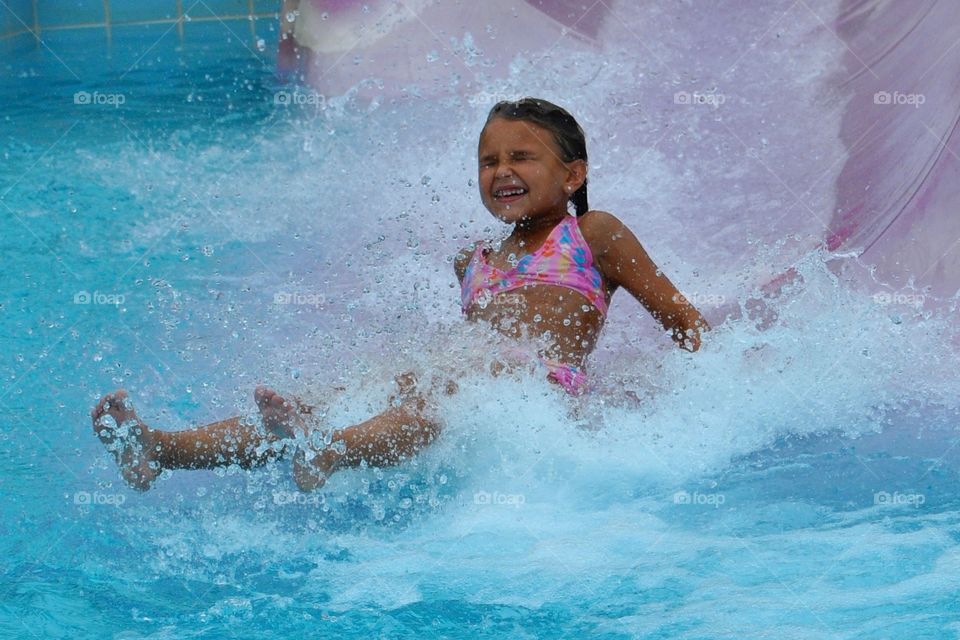 Girl enjoying water slide
