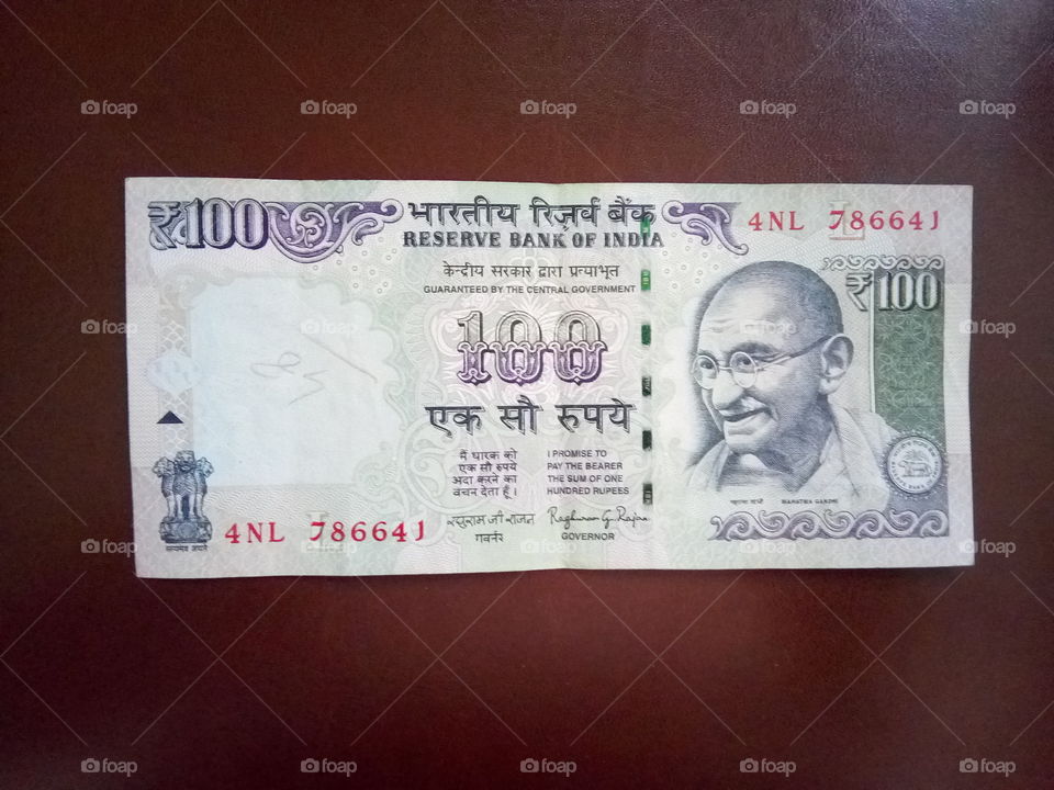 100 rupees Indian currency with unique Holly number 786
