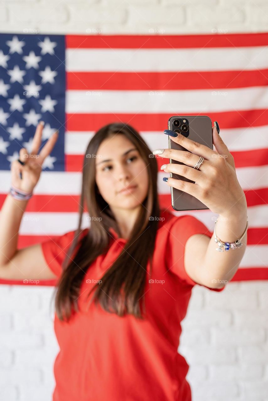 woman holding USA flag