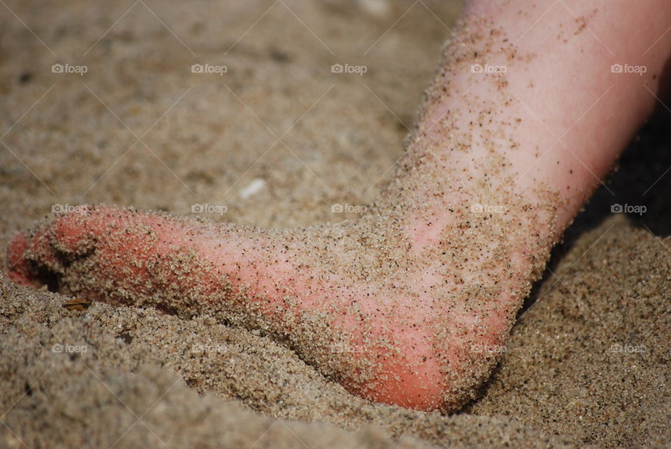 Foot in sand