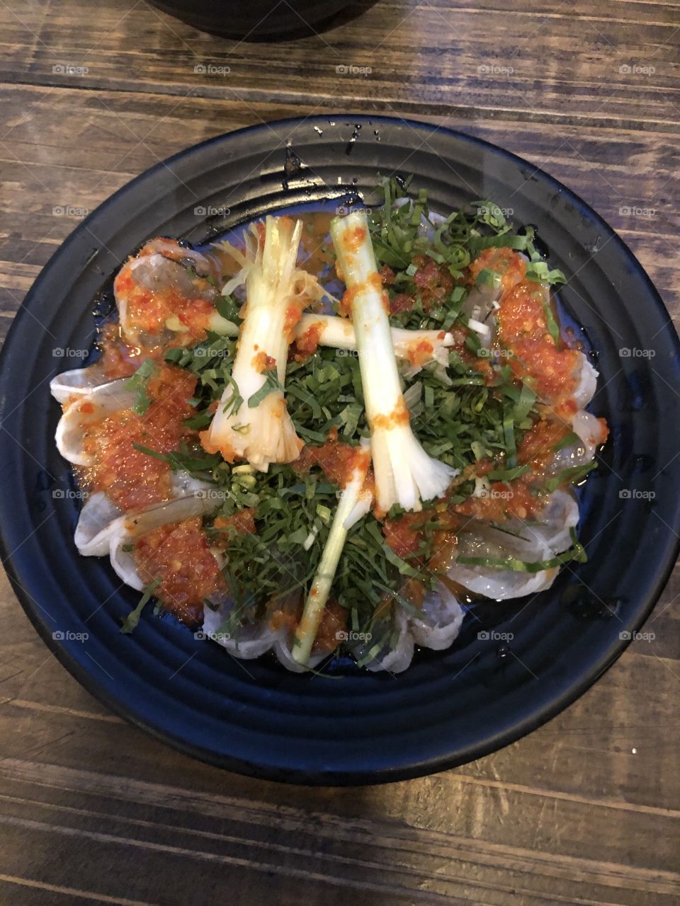 Raw shrimp made in Thai style. Serve with delicious dipping sauce. This dish is only for those who can eat spicy