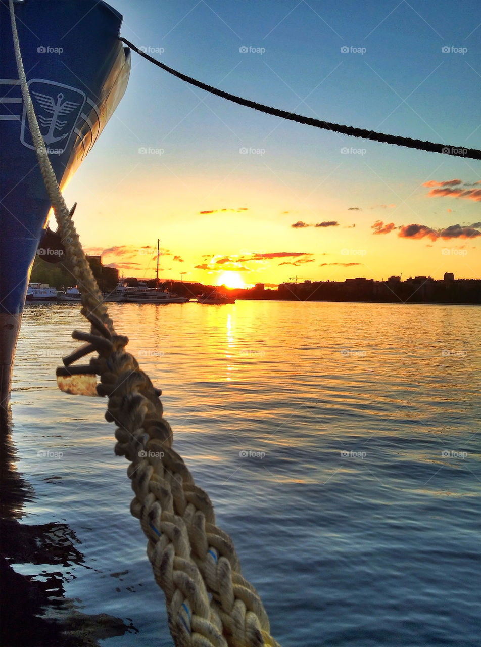 sweden stockholm sunset boats by kajic