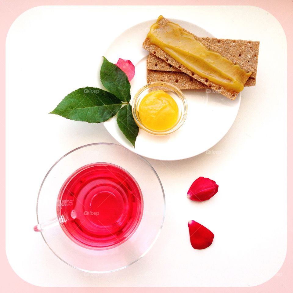 Rose tea and toasts with orange kurd