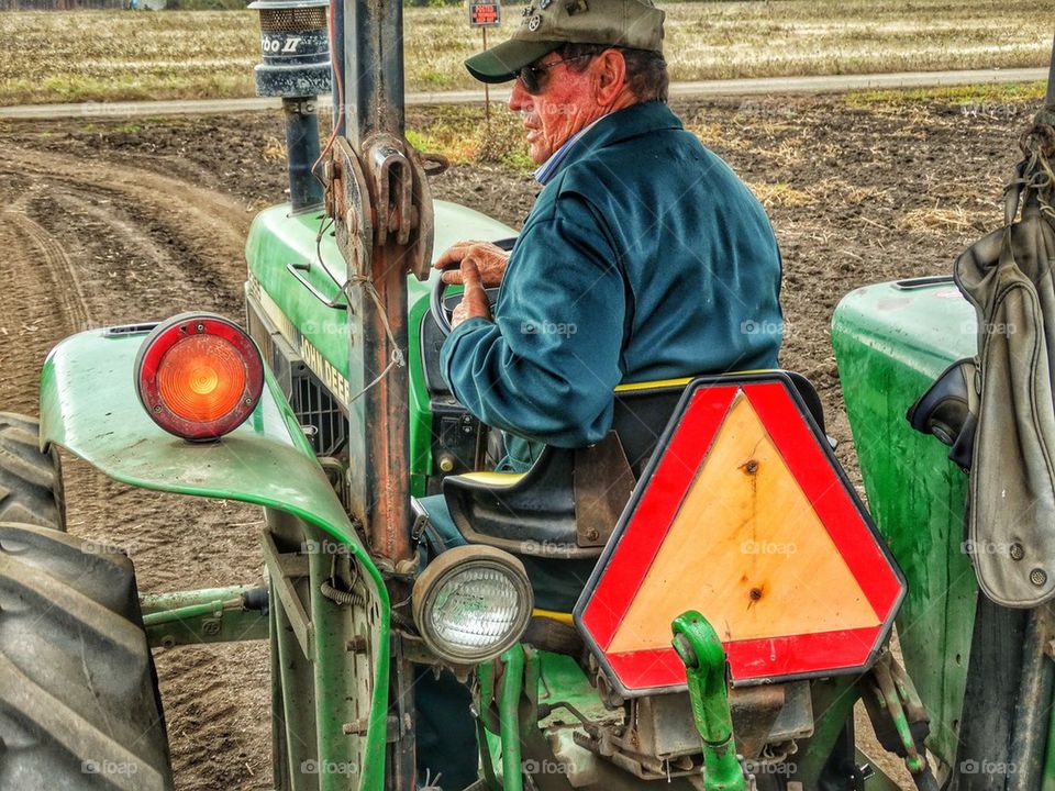 Farmer On His Tractor