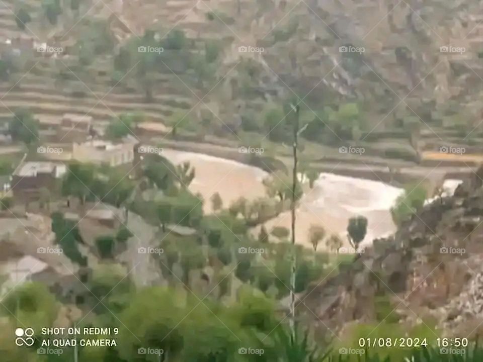 Glory be to God, the magnificent and picturesque view and the natural green trees are a view that is nothing more wonderful than it