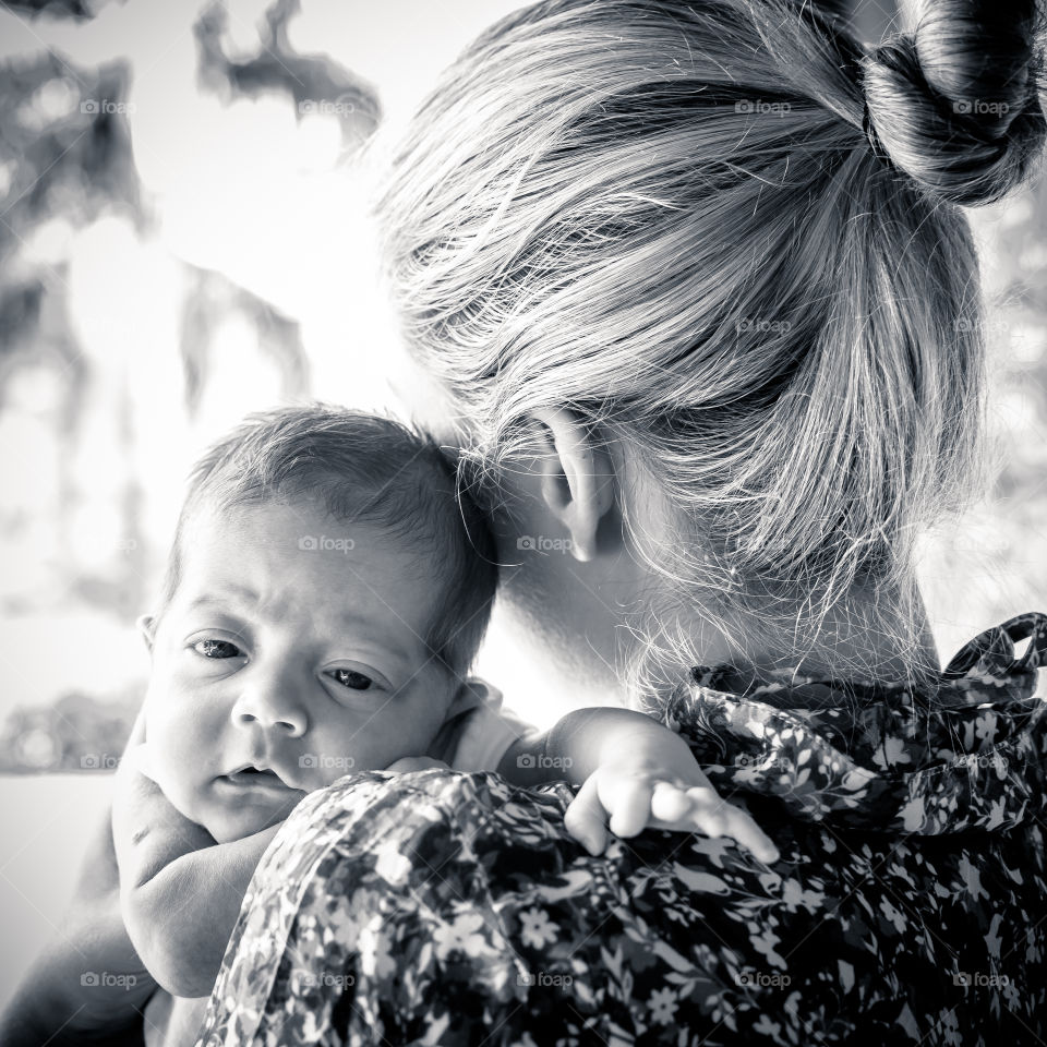 mother and son. shot of a mother with her son on a love moment