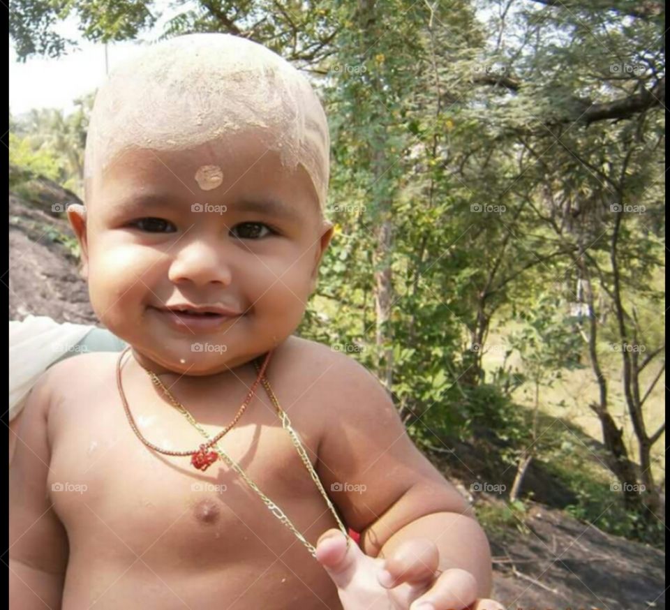 Portrait of an Indian bald baby