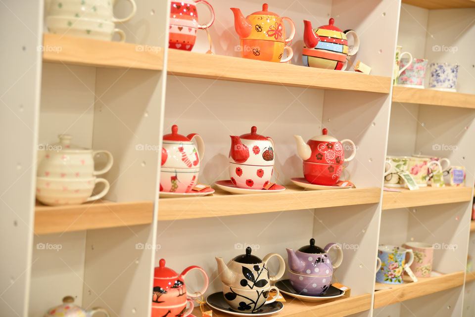 Tea pot mug on shelves