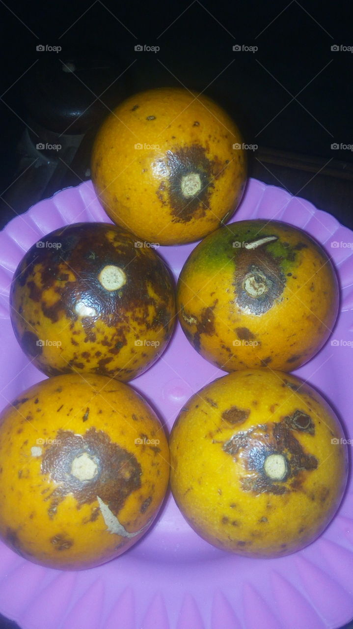 It is plate that it's structure can find is orange but this is not orange this fruit is called ntonga