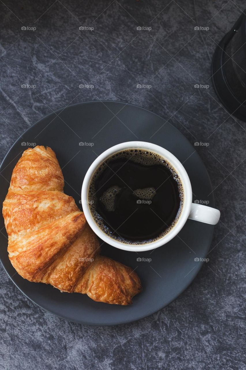 Black coffee and  croissant: Live like the French.