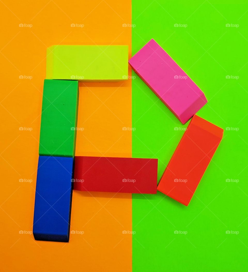 Multicolored rectangles spelling out the letter P