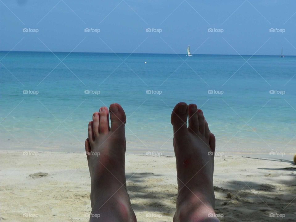 feet by the ocean