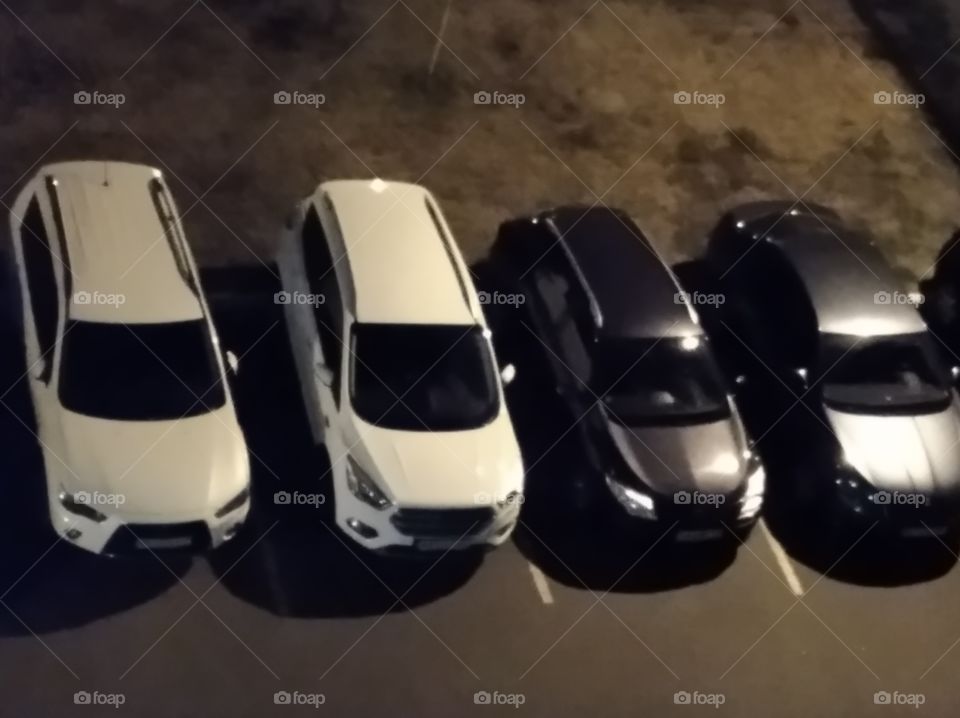 Cars in the parking lot, view from the top