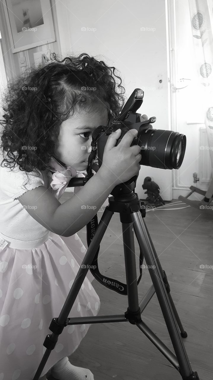 Grandaughter playing with my camera