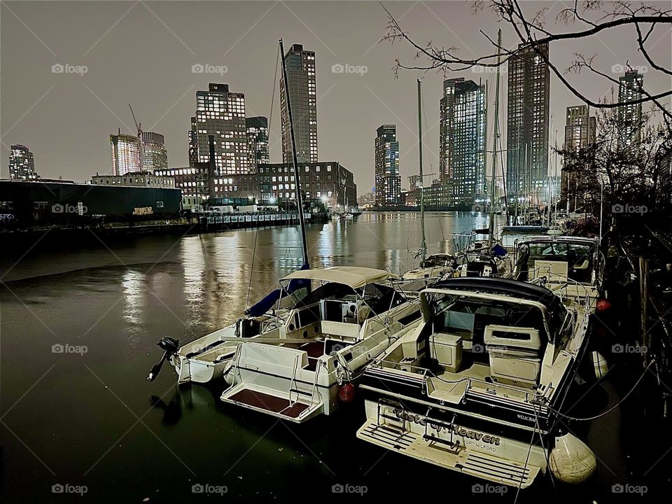 This is beautiful “Newtown Creek” by the “Pulaski Bridge” in LIC, Queens especially charming with its boats after dark when the nighttime illumination of the city reflects back from the water of the “East River”. 2023. Hypnotic Productions