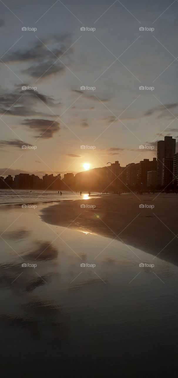 Sunset in Pitangueiras Beach, Guarujá, Brazil