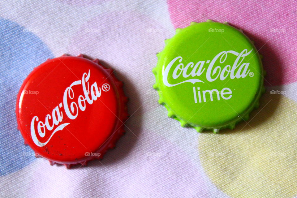 Coca cola caps green and red