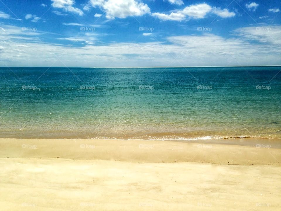 deserted beach, sand, sky and sea