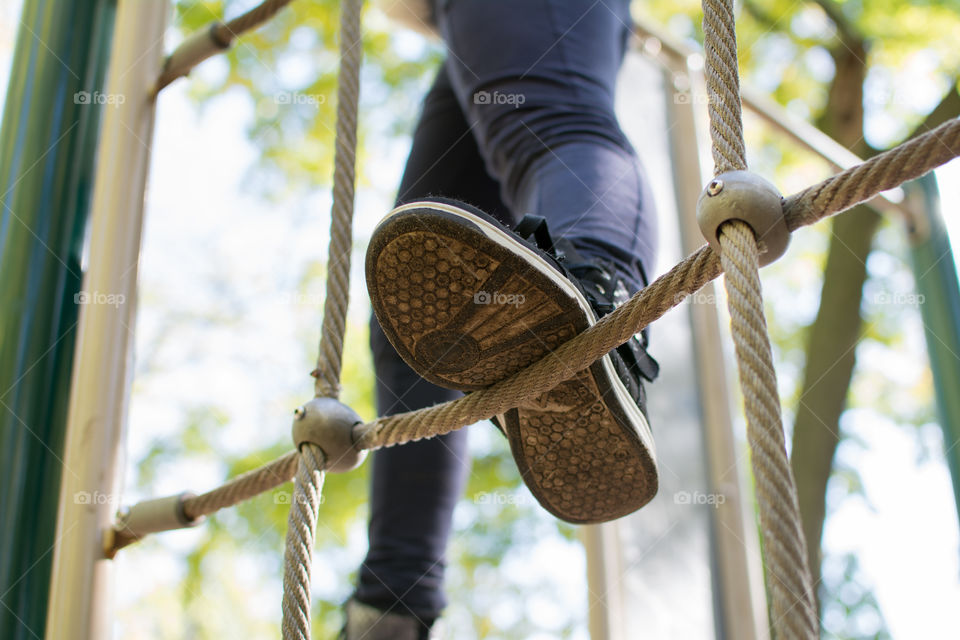 kid leg close up on playground