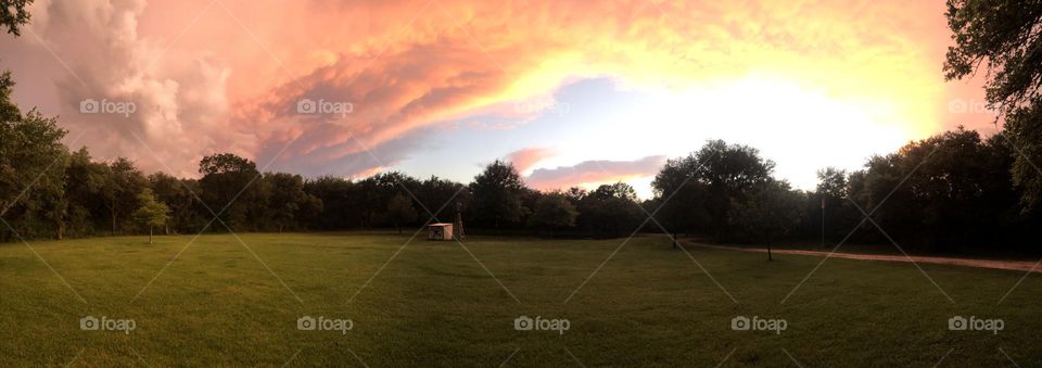 Panorama view of the storm moving in at the ranch in Texas. It was sunset and the colors kept changing and no filters!