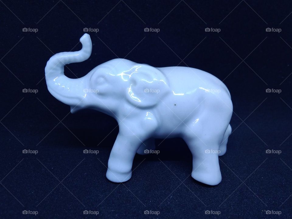 White glass elephant figurine