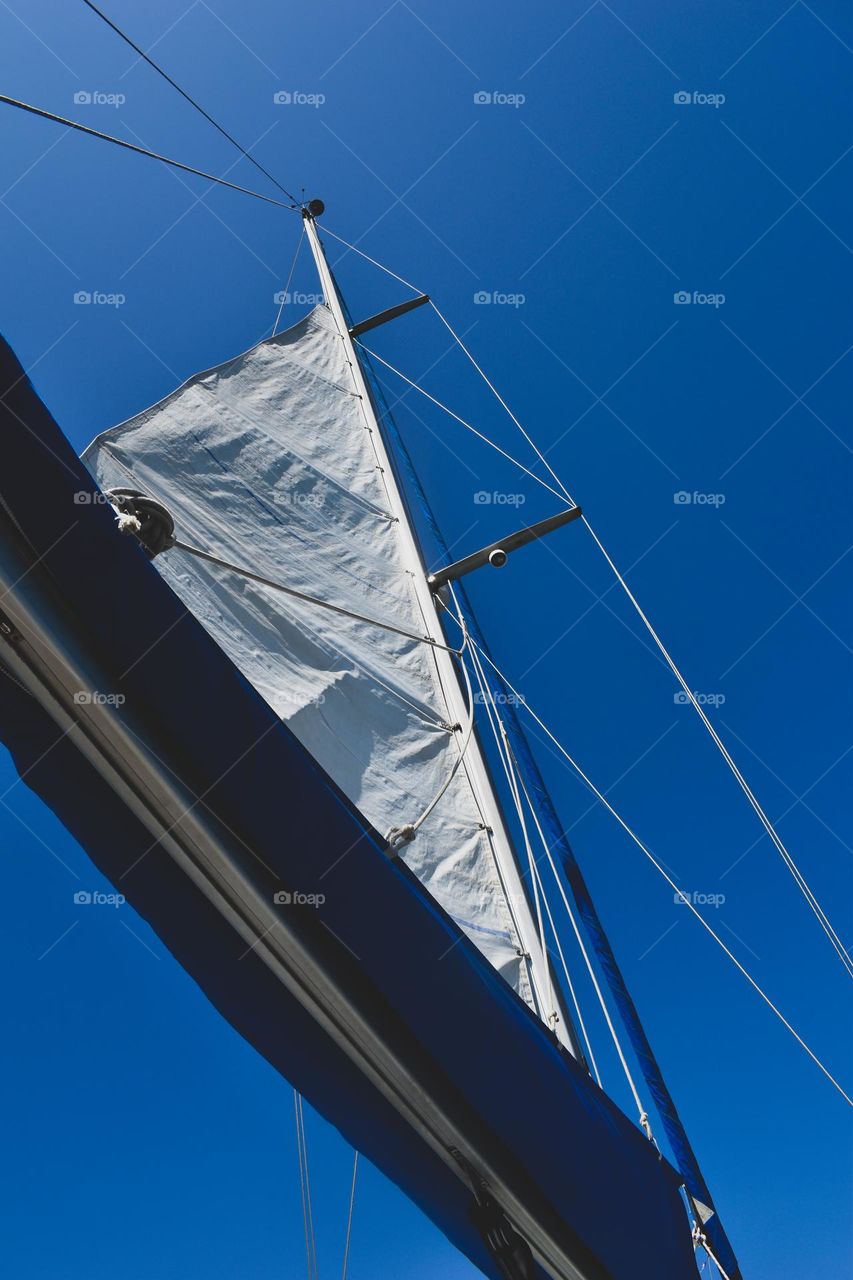 Sailing boat . Triangle shapes ,rope wingsailing. Wing on wing 