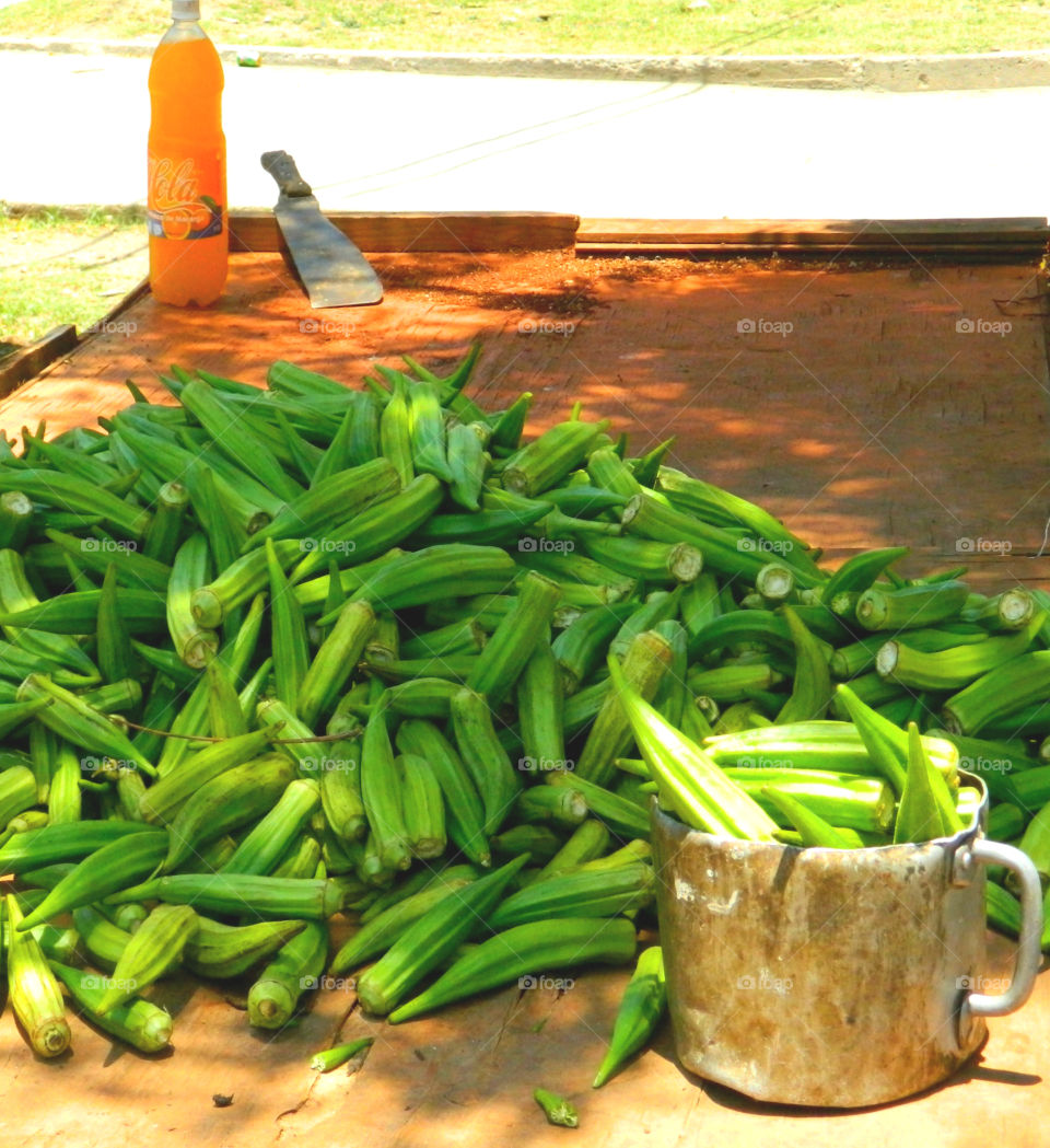 Cuba: Street vender sells okra! As I see Santiago de Cuba in black and white, and sometimes in color! Cuba is a special destination and people know how to enjoy themselves, despite obvious signs of poverty and hardships. The streets are filled with vibrant colors and rhythm and it is not uncommon to see people dancing in the streets and alleys to the sound of loud salsa music! Wish I could, but It's impossible to capture it all! 