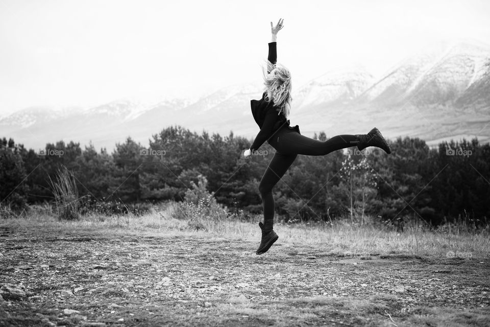 girl dancing on the mountain