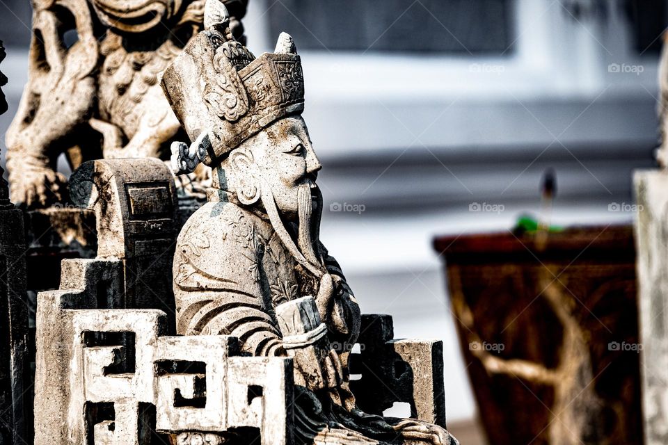 Statue at Wat Arun temple Bangkok