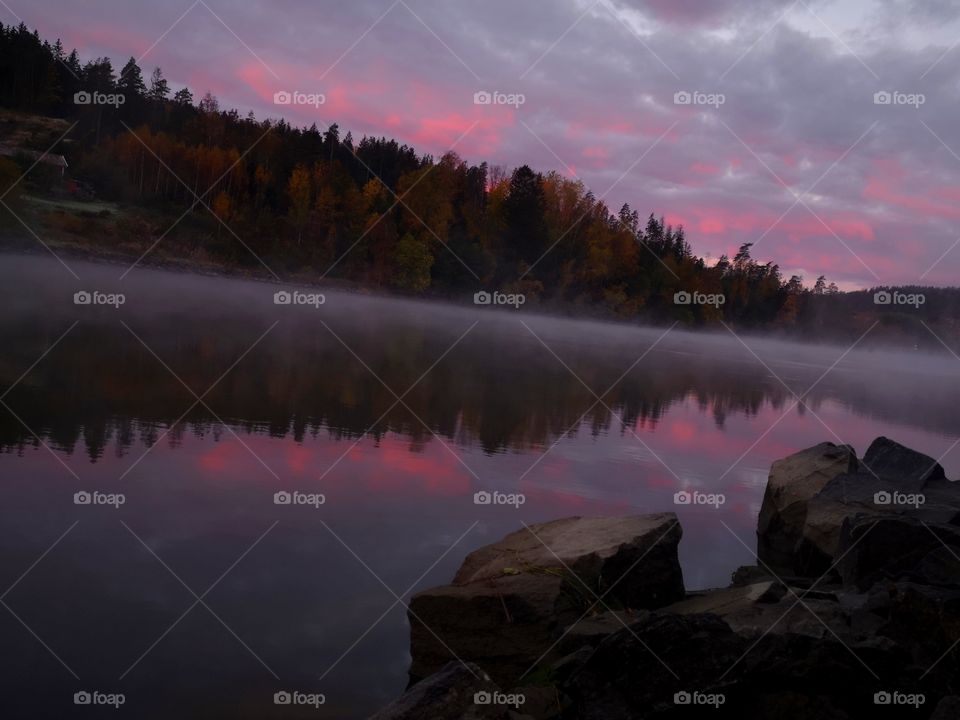 Gorgeous morning and beautiful sunrise with those colors reflected in the watwe of Götaälv(Götariver) Sweden