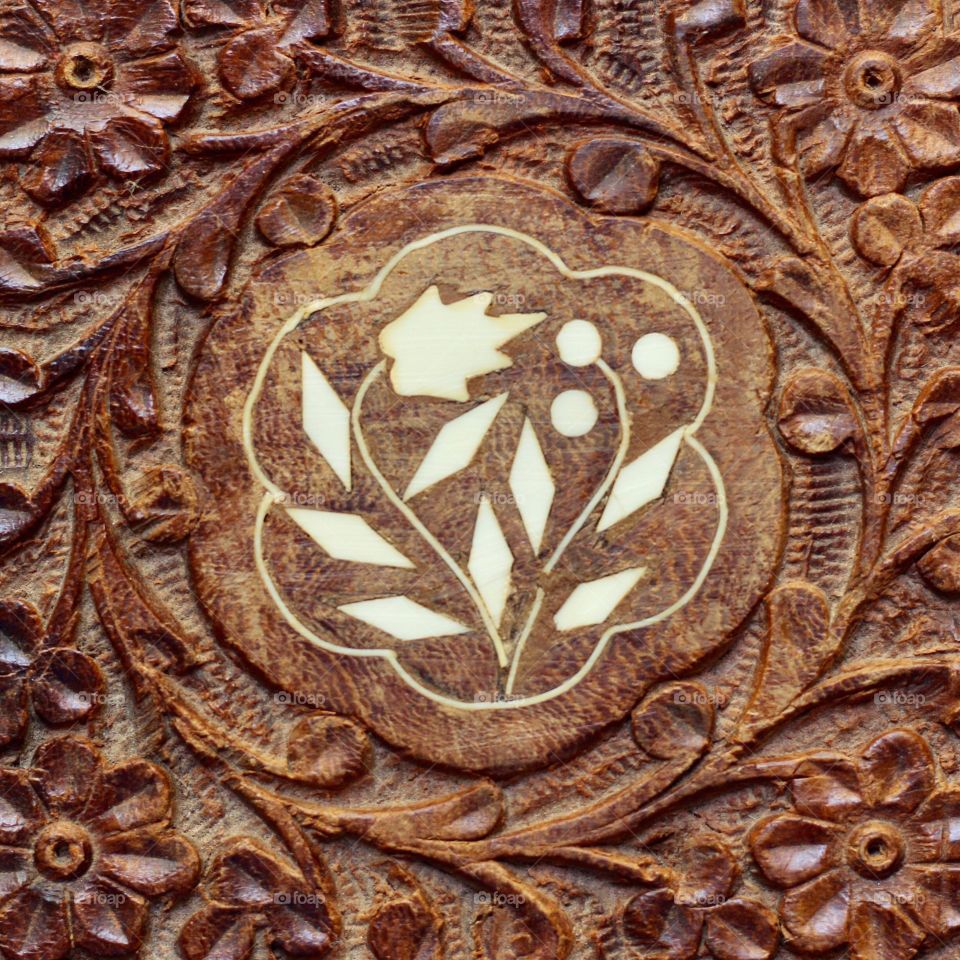 Creative Textures - surface of carved wooden box with ivory inlay