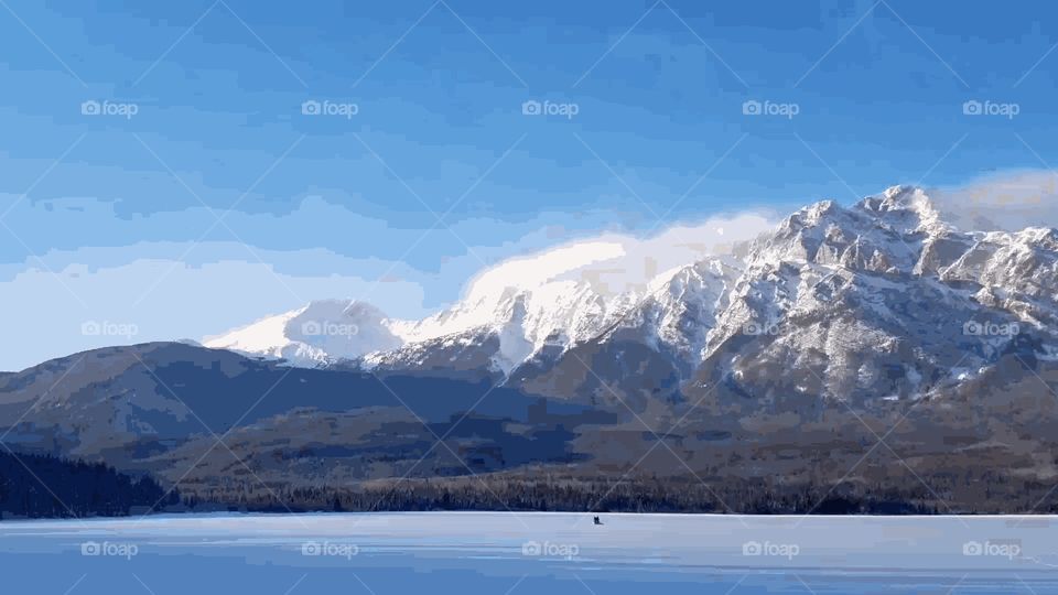 Biking Riding across Frozen Lake