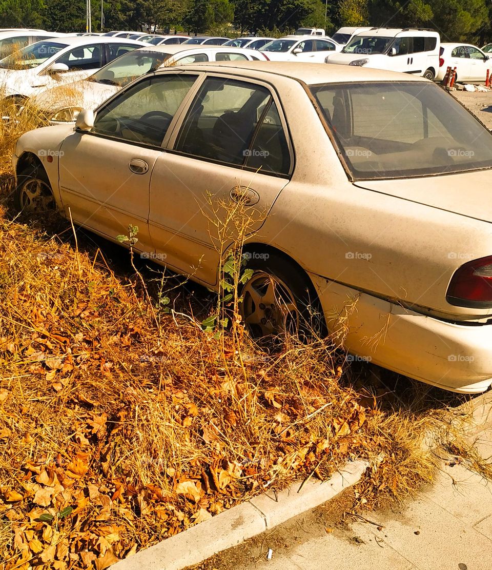 Broken car in the parking lot