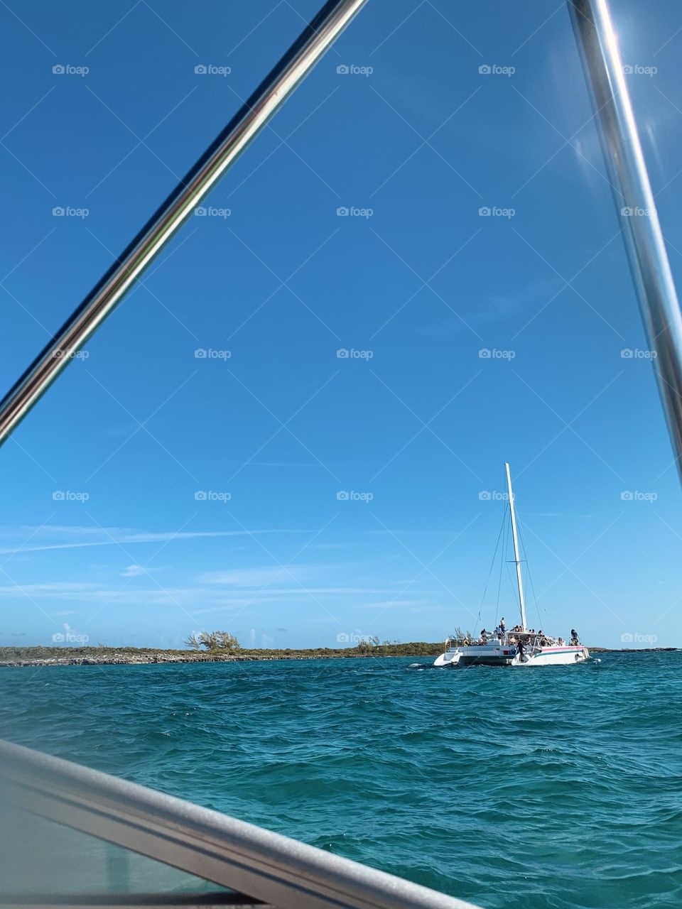 Shore boat shuttling tourists - Island Hoping Bahamas