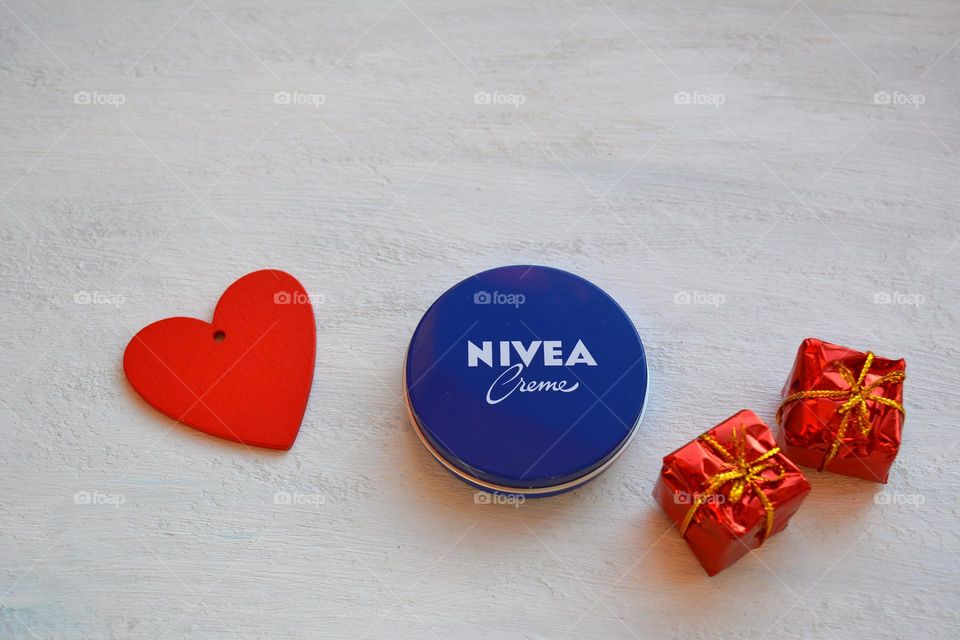 love Nivea, cream in the female hands