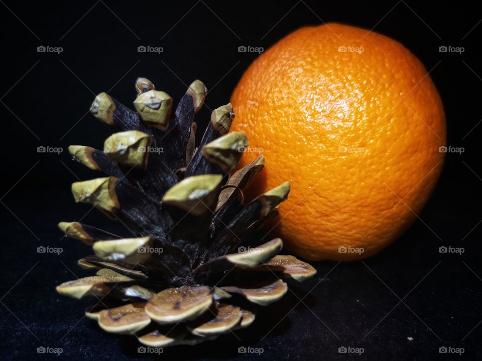 Orange and pinecone