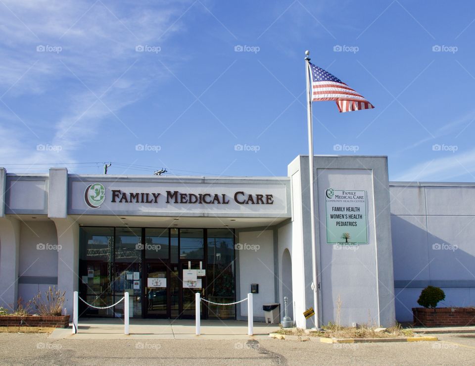 American flag outside of a medical building 