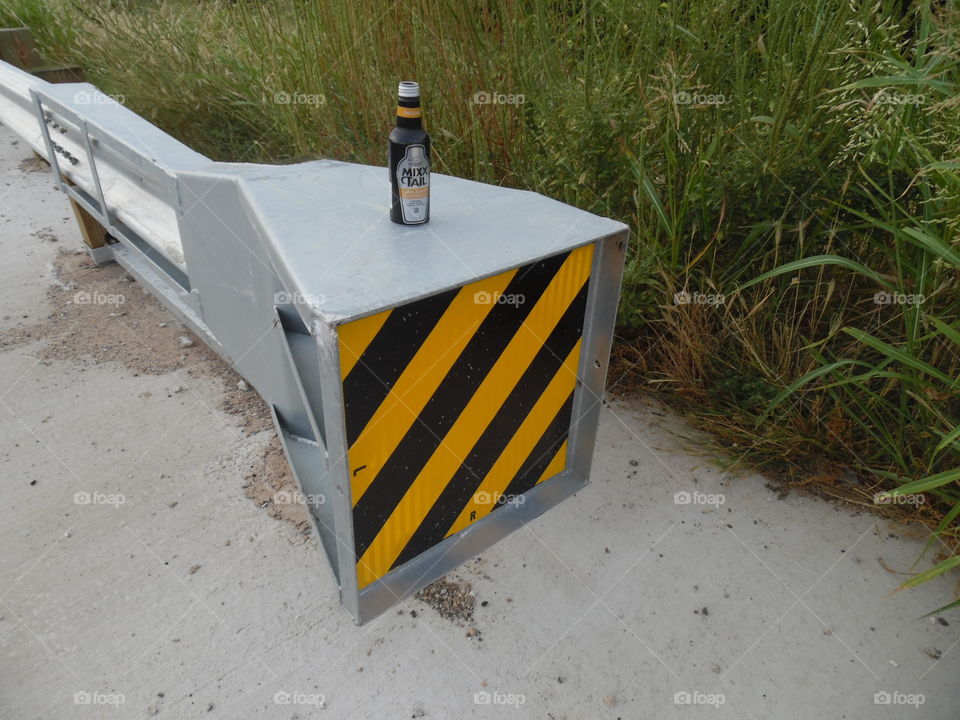 dead end 🔚. This is a picture of a alcoholic beverage that I consumed by this guardrail. 👣 🚶 🏃 🔥 💨