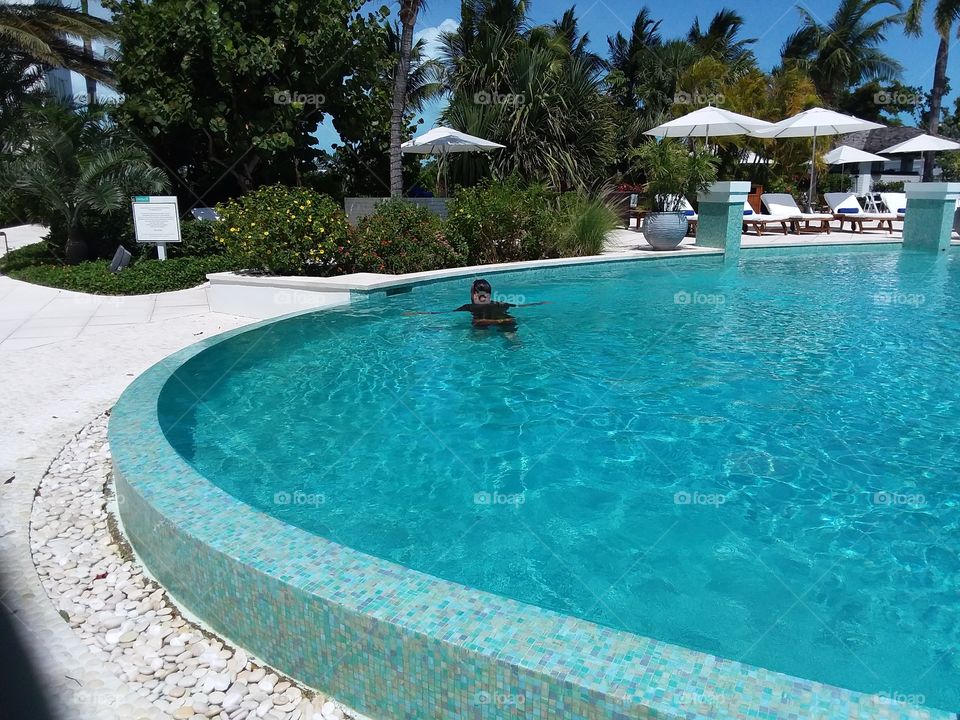 swimming in infinity pool