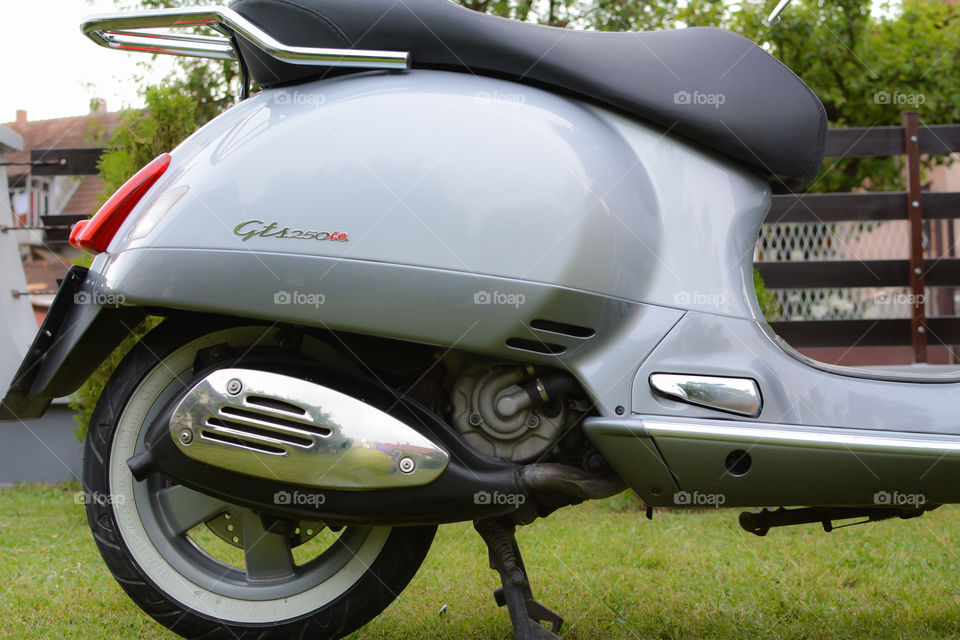 grey vespa GTS motorcycle, italian style