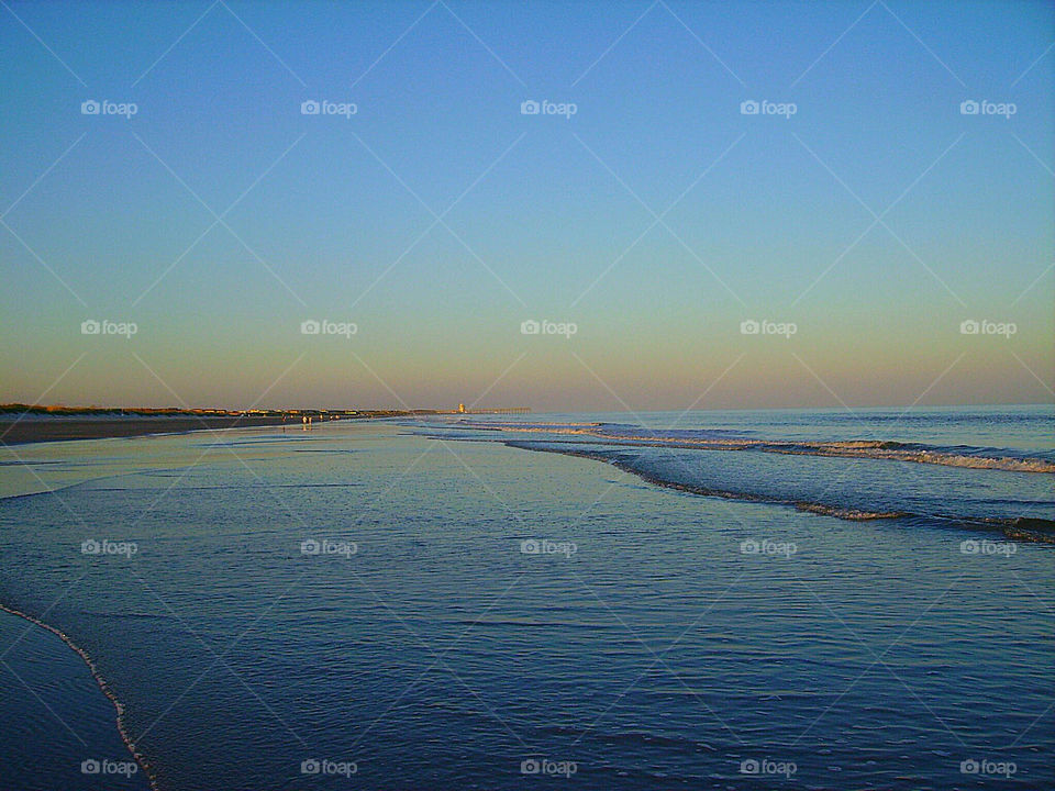 beach sunset water waves by silkenjade